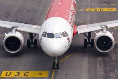 View of airplane at airport runway