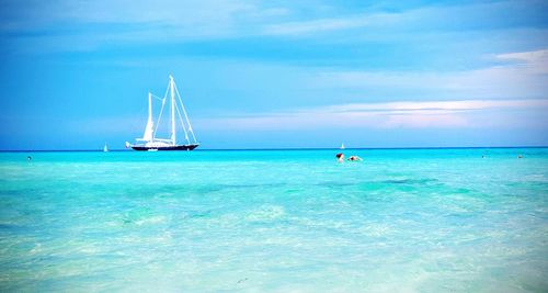 Boats sailing in sea