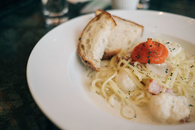 Close-up of pasta served in plate