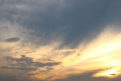 Low angle view of dramatic sky during sunset