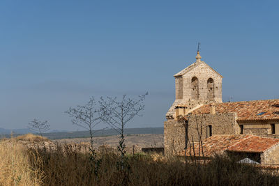 Low angle view of moya's church against clear sky