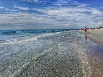 Scenic view of sea against cloudy sky