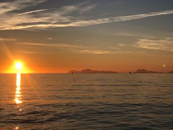 Scenic view of sea against sky during sunset