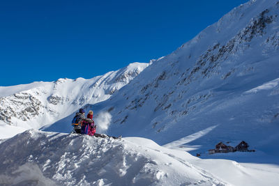 Scenic view of snowcapped mountain against sky