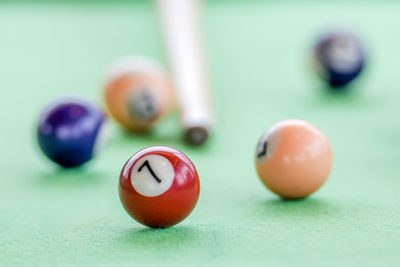 Close-up of pool balls on table