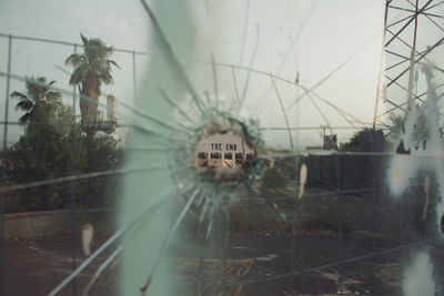 Digital composite image of glass window in city