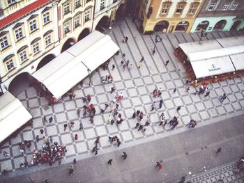 View of people walking on tiled floor