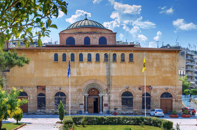 Facade of historic building against sky