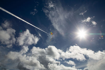 Low angle view of kite flying in sky