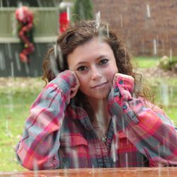 Portrait of young woman using smart phone outdoors