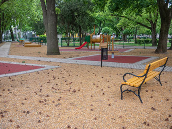 Empty bench in park