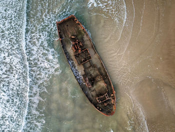 Wrecked boat from above