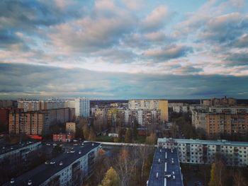 High angle view of buildings against sky at sunset