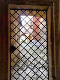 Close-up of glass window of building