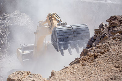 High angle view of machinery on rock