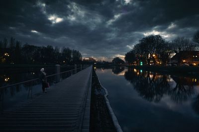 View of illuminated bridge against cloudy sky