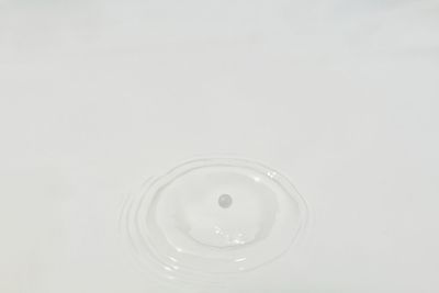 High angle view of water drop on glass