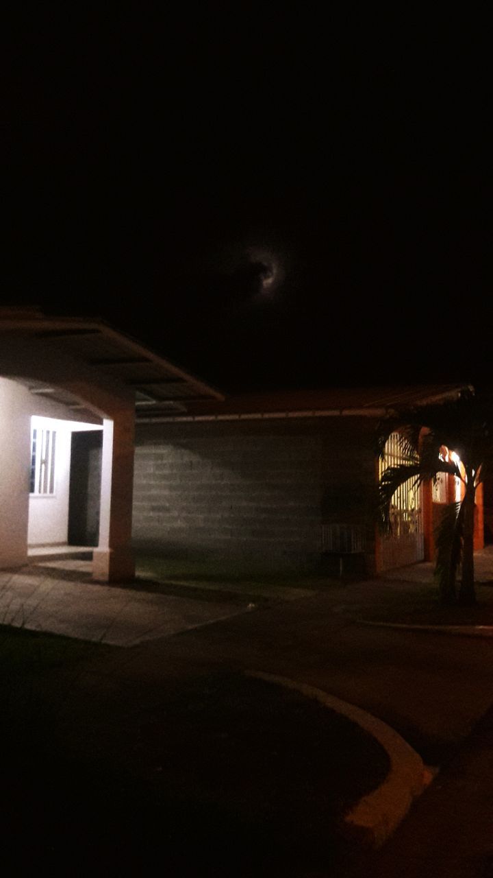 night, architecture, built structure, illuminated, building exterior, dark, sky, street, house, copy space, window, silhouette, building, no people, empty, outdoors, road, dusk, lighting equipment, street light