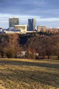 Buildings in city against sky