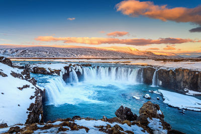 Scenic view of godafoss falls against sky