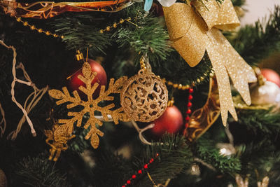 Close-up of christmas decoration hanging on tree