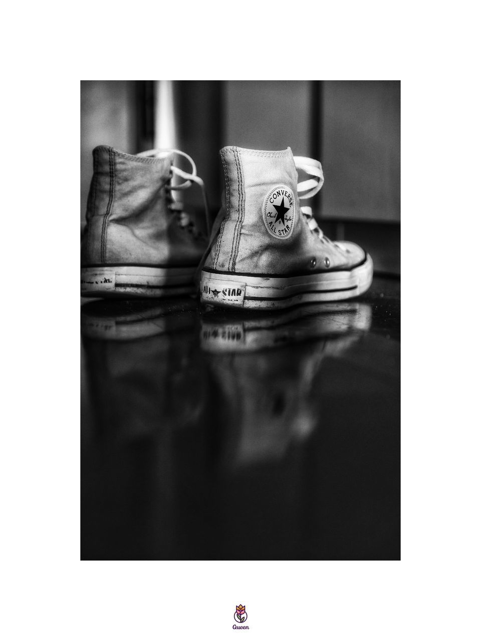 HIGH ANGLE VIEW OF SHOES ON TABLE AGAINST GRAY BACKGROUND