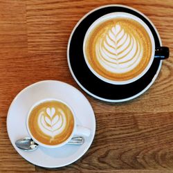 High angle view of cappuccino on table