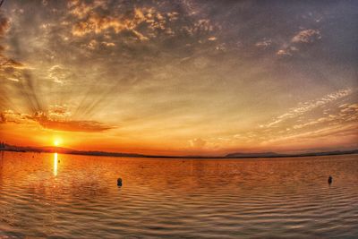 Scenic view of sea at sunset