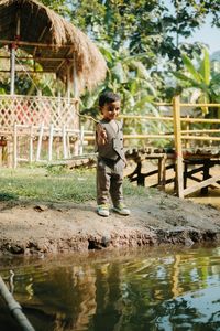 Full length of man standing in water