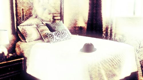 Close-up of lamp on table