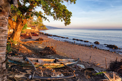 Scenic view of sea against sky at sunset