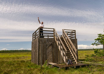 House on field against sky