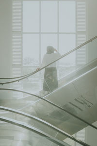 Man working on staircase