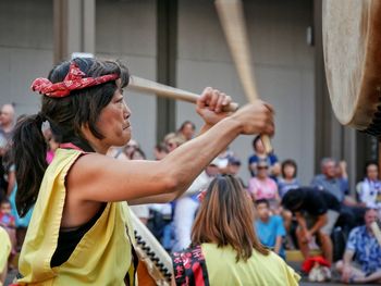 Woman with arms raised