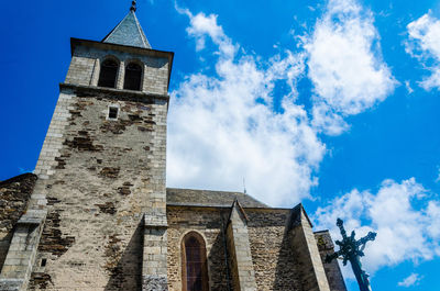Low angle view of historic building against sky