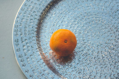 Close-up of fruit in plate on table