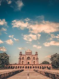 Low angle view of building against sky during sunset