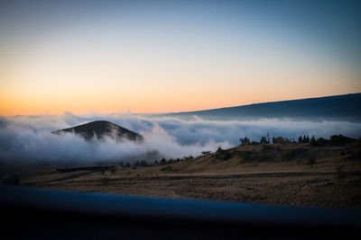 Scenic view of landscape against sky during sunset