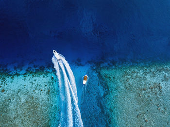 People swimming in sea