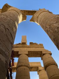 Low angle view of old ruins against clear sky