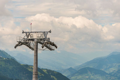 Construction of a new ski lift. support pole, no steel ropes, standing alone on the slope mountains