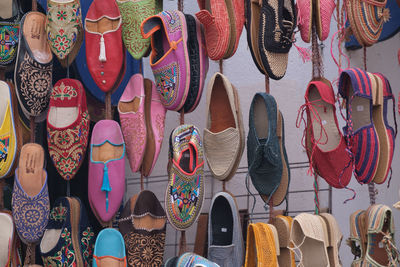 Full frame shot of shoes for sale at market