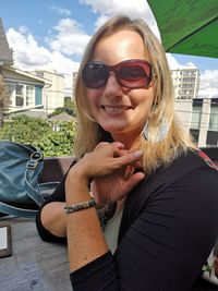 Portrait of smiling man wearing sunglasses