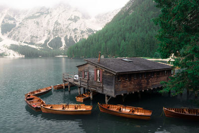 Boats moored at harbor