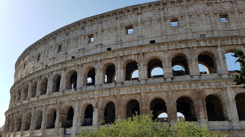 Low angle view of historical building against sky colosseum 