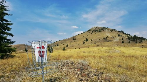 Scenic view of landscape against blue sky