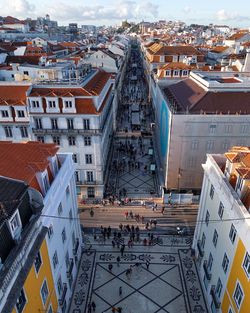 High angle view of street amidst buildings in town