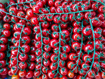 Full frame shot of red chili peppers at market stall