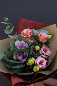 High angle view of pink roses on table