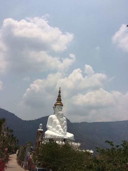 religion, spirituality, place of worship, sky, cloud - sky, cross, mountain, temple - building, cloud, day, travel destinations, tranquility, nature, cloudy, tranquil scene, outdoors, tourism, no people, beauty in nature, scenics